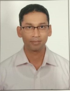 Dr. Magesh B